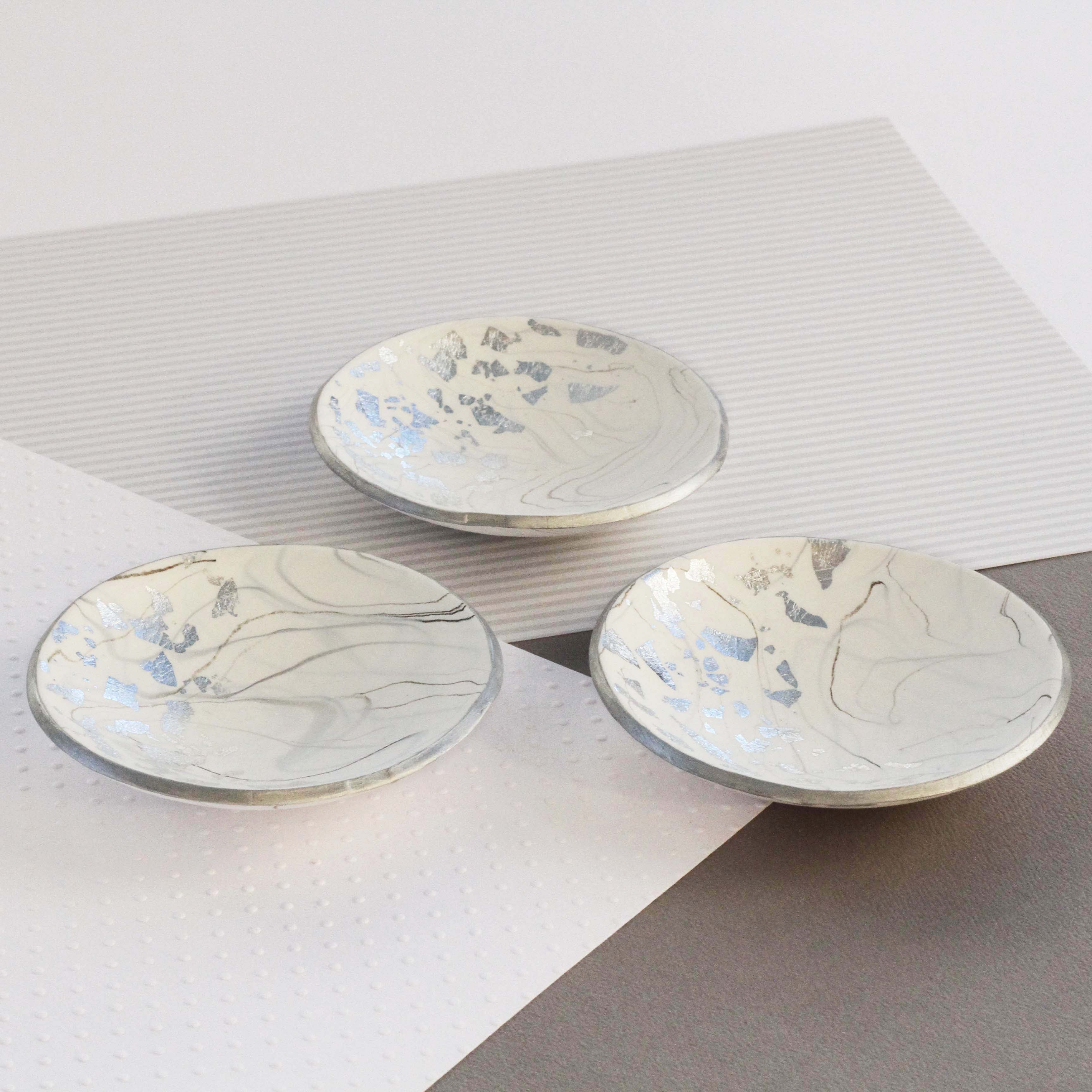 White marble and silver trinket dish