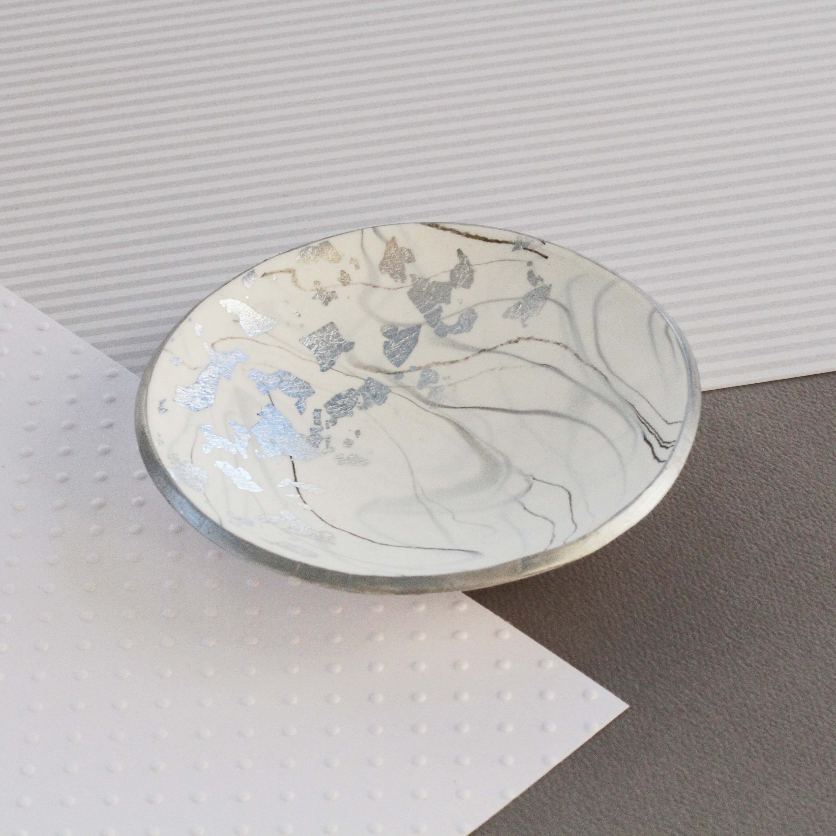 White marble and silver trinket dish